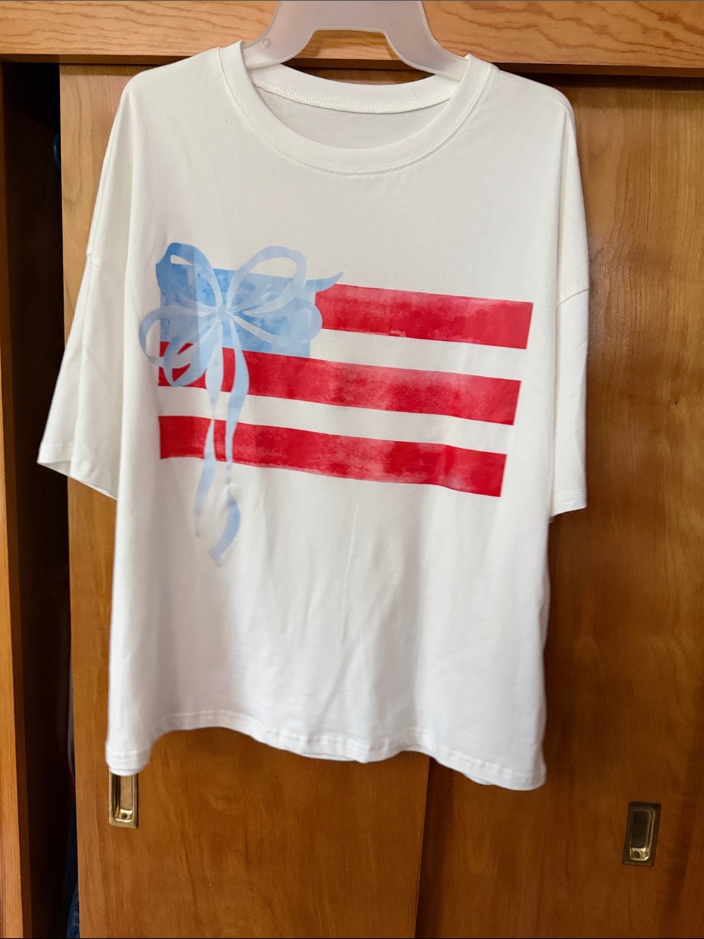 Women’s White Short-Sleeve Tee with Red Stripes and Blue Bow Graphic
